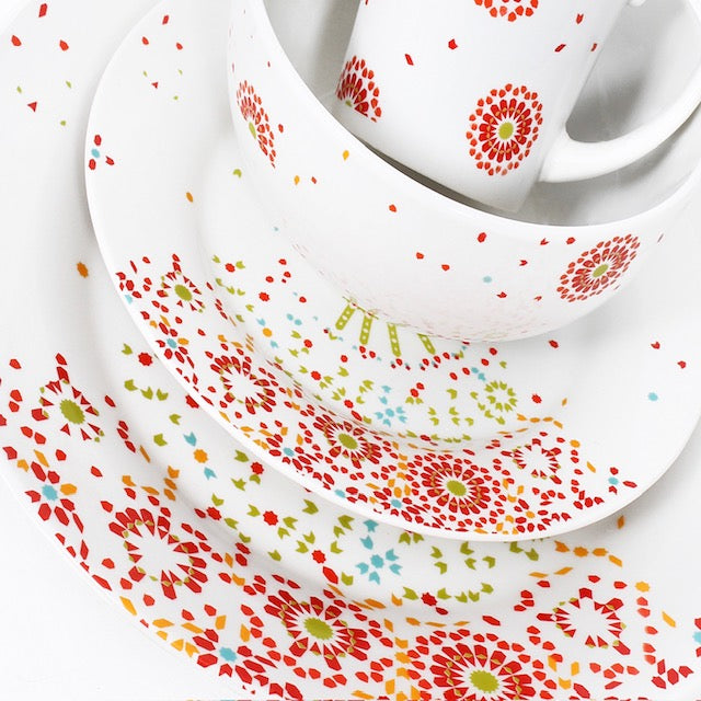 A Moroccan inspired dinner set with a multi colour mosaic pattern