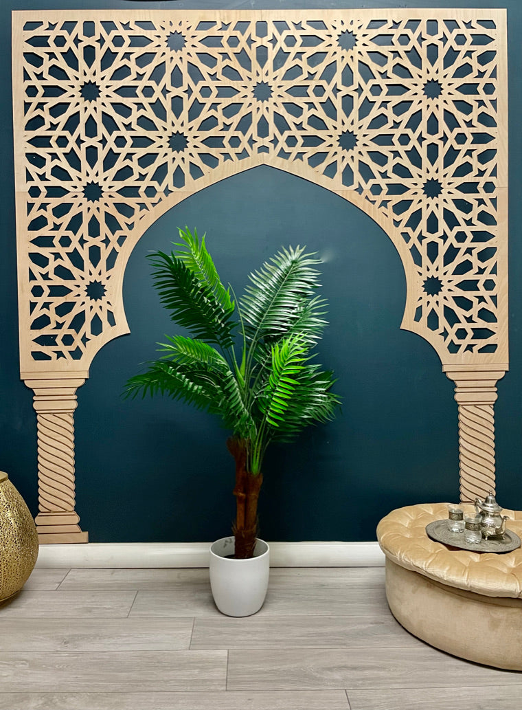 Single decorative arch on a blue Wall