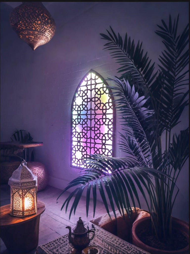 Arched Moroccan decorative panel fitted with Sound Sync LED Strips.